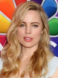 How tall is Melissa George?